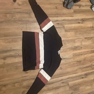 made in mexico , it’s a dark blue, white and a burgundy ish color